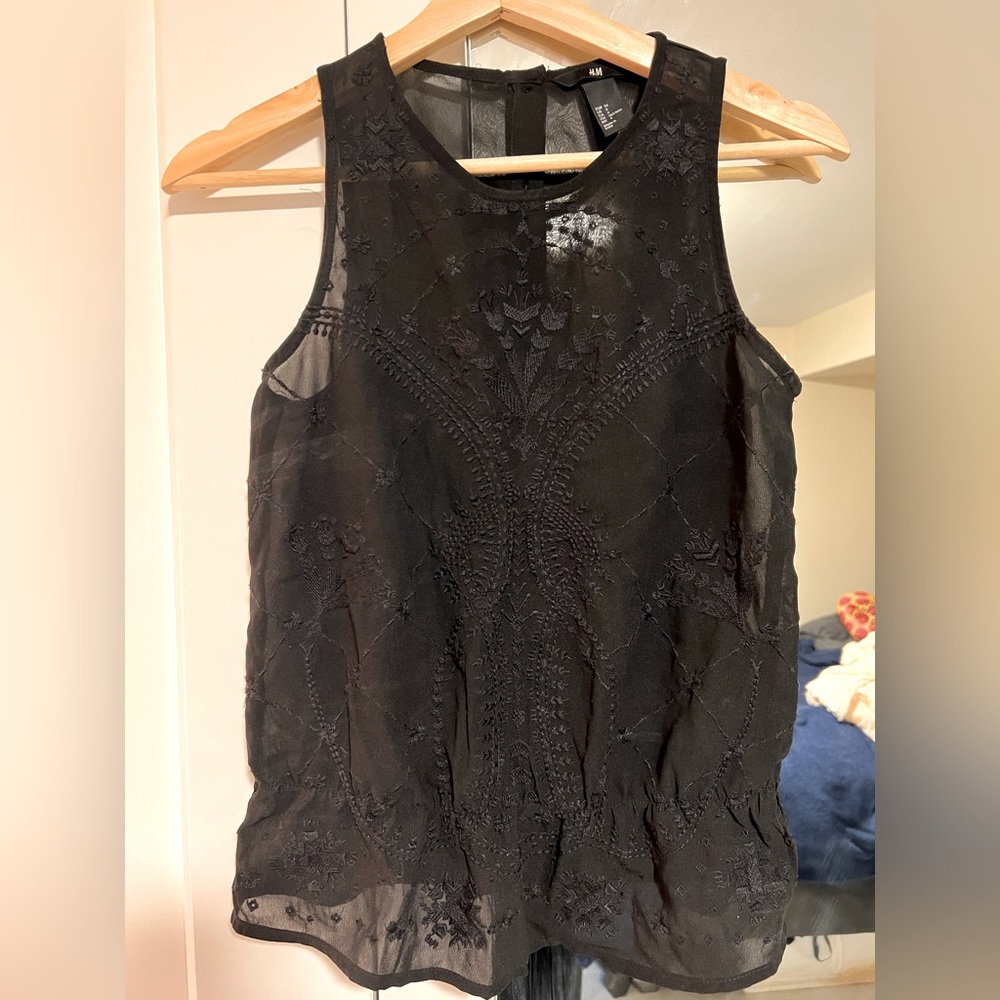 Embroidered sleeveless blouse